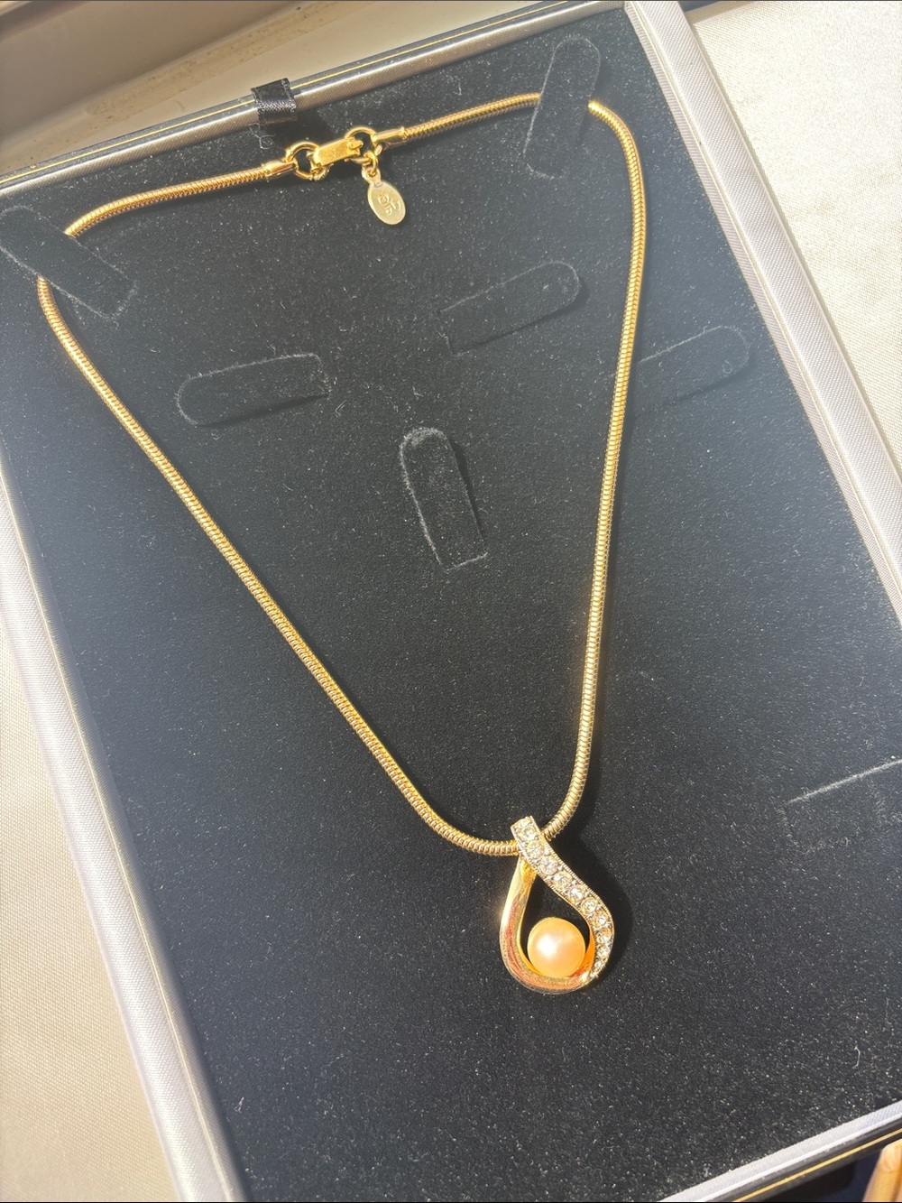Diane Von Furstenberg Gold Pearl Teardrop Necklace with Crystal Accents - Picture 2 of 7